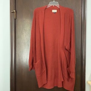 This is a Universal Thread cardigan. Size is XL and the color is burnt orange.